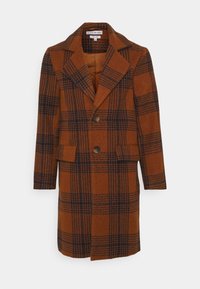 Manteau en laine marron à carreaux avec un col cranté, deux poches avant et trois boutons. Tissu texturé avec des accents bleu marine.