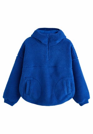 Niebieski polarowy sweter z wysokim kołnierzem, zamkiem błyskawicznym do połowy, dużymi przednimi kieszeniami i ściągaczami przy rękawach. Miękka tekstura i luźny krój.