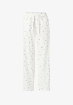 White drawstring pajama pants with small blue floral print, straight-leg fit, and elastic waistband.