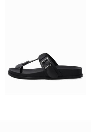 Black flip-flop sandals with a thong design, featuring a wide strap and metal buckle accent. Smooth rubber sole for comfort.