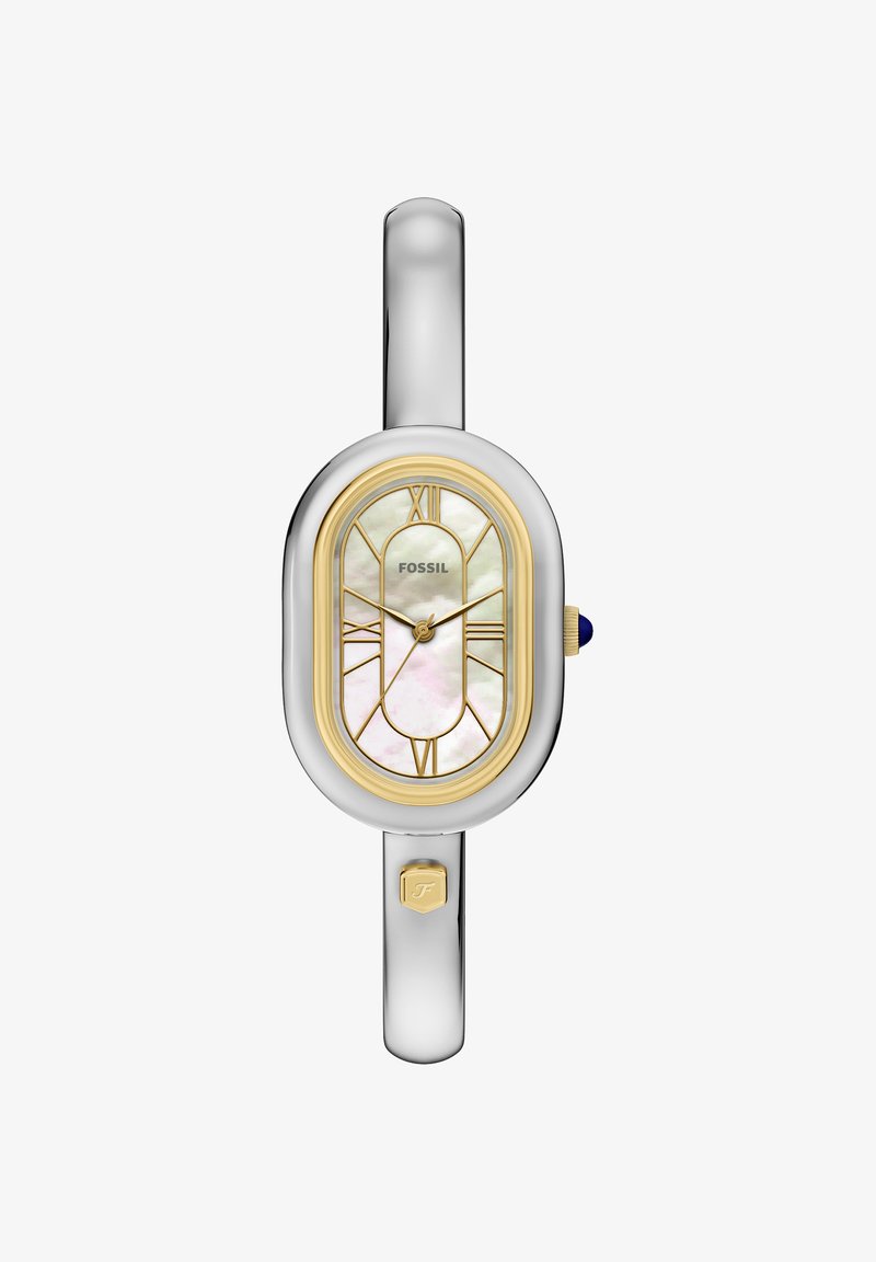 Rustfrit stål ur i sølvfarve med oval urkasse, gyldne detaljer, skive af perlemor og en blå krone. Romerske tal som markører på urskiven.