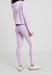adidas Originals Legíny - kalhoty  - purple