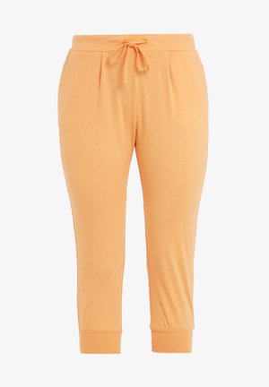 Peedi värvi joggingupüksid pehmest kangast, elastse vöökoha ja nööriga, kitsenevate hõlmadega.