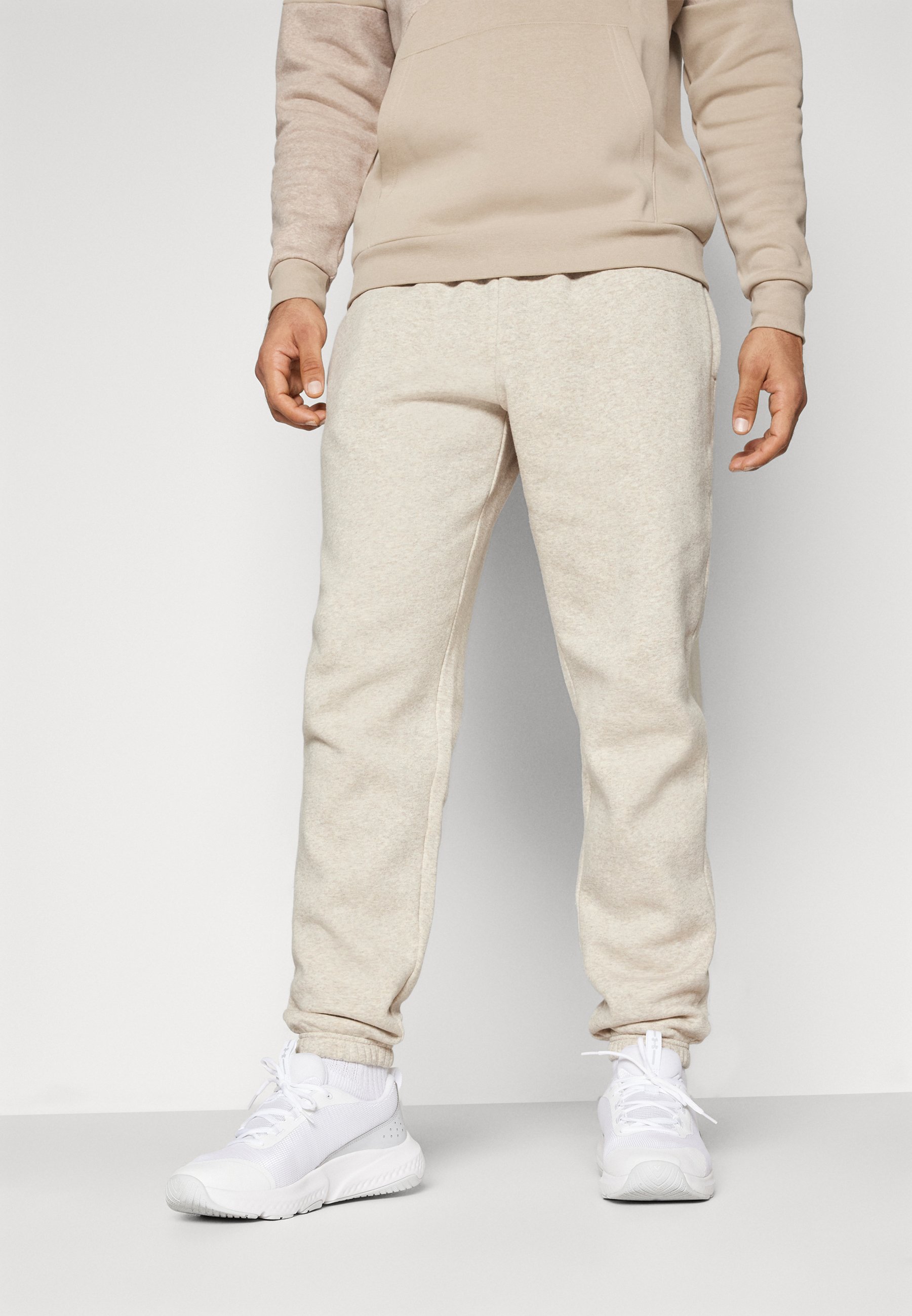 Under Armour ICON FLEECE - Tracksuit bottoms - timberwolf taupe