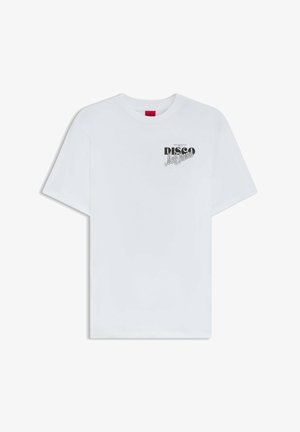 White cotton t-shirt featuring short sleeves and a crew neckline. Graphic text design in black reading "DISCO Melodrama" on the chest.