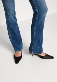 Pepe Jeans NEW PIMLICO - Calças de ganga à boca de sino - denim