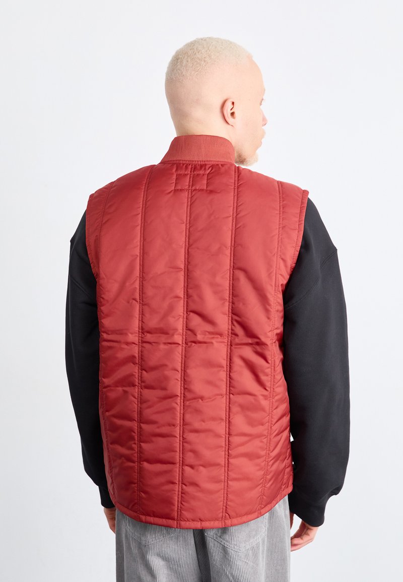 Carhartt WIP LACHLAN VEST LINER - Waistcoat - vermillion/light red 