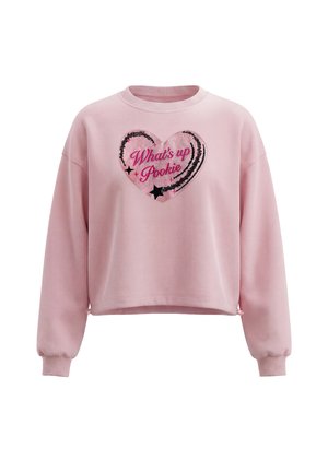 Pink langærmet sweatshirt med ribkantede ærmeafslutninger og et hjerteformet palietdesign med teksten "What's up Pookie" på brystet.