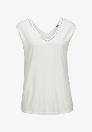 White short-sleeve top with a V-neckline, featuring layered fabric accents at the neck and a loose-fitting design.
