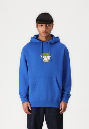 Blue hoodie made of soft fabric, featuring a front pocket and a graphic logo in green and white on the chest. Adjustable drawstring hood.