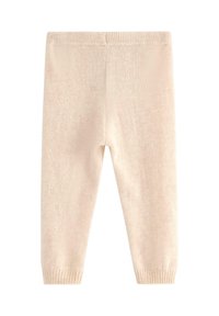 Lyserøde, bløde leggings med ribbet talje og ankelsyninger. Glat tekstur, ankellang klipning, ingen synlige mønstre eller hardware.