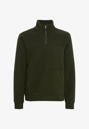 Sötétzöld bolyhos pulóver fél cipzáros gallérral, kenguruzsebbel és bordázott mandzsettákkal. Puha textúra, minimalista dizájn és minta nélküli.