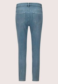 Hellblaue Jeans aus Denim mit Slim-Fit. Verfügt über Gesäßtaschen und ein sauberes Design. Gerade Beine mit einer leichten Verjüngung an den Knöcheln.