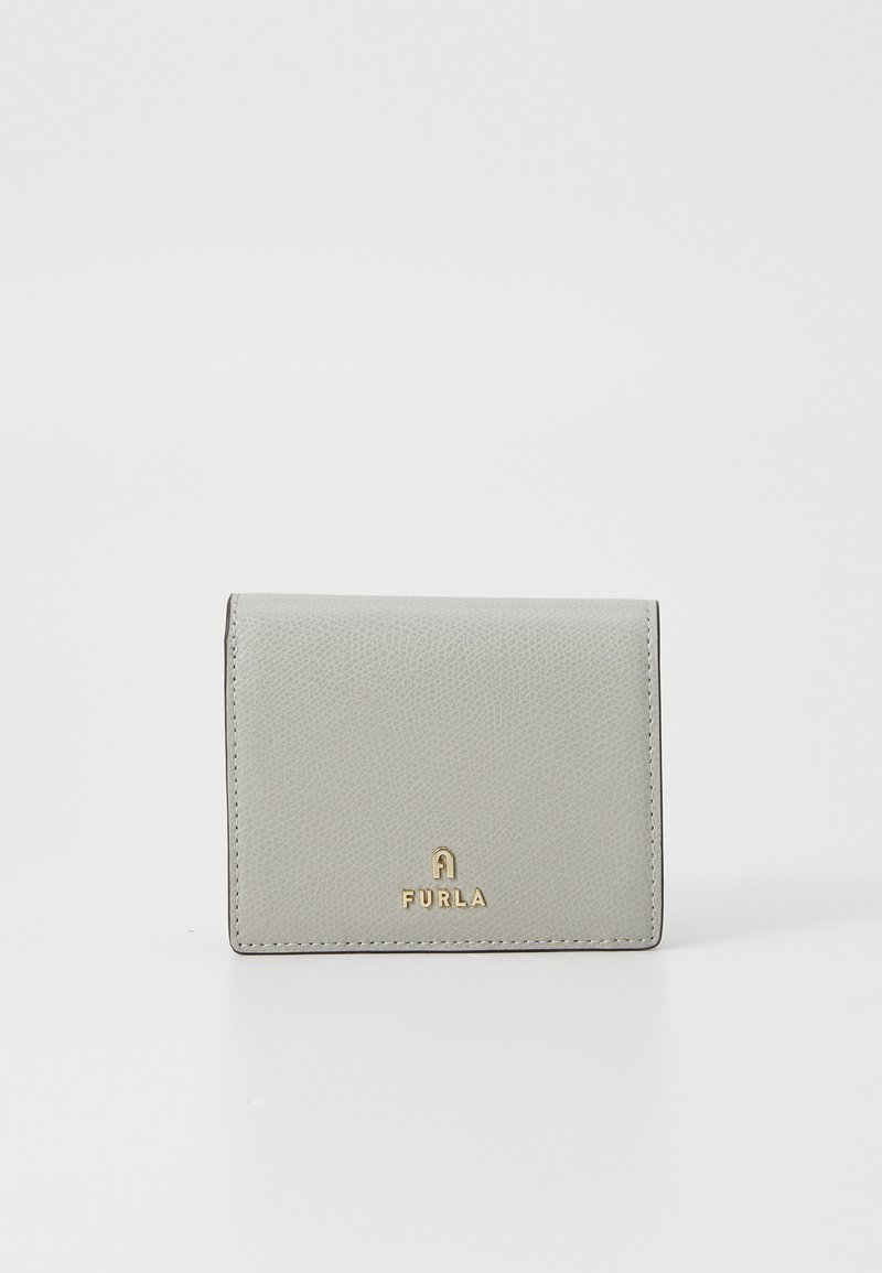 Light gray leather wallet with textured finish, folded design, and gold logo accent. Compact rectangular shape with clean edges.
