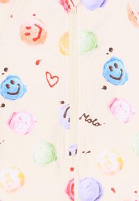 Body en thème de crème glacée de couleur crème, orné de visages souriants colorés et de cœurs. Fermeture éclair à l'avant avec une écriture stylisée en détail chocolat.