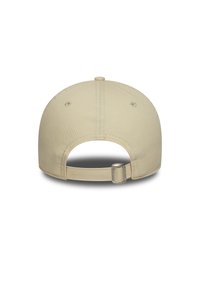 Beige cap with a rounded crown and adjustable strap at the back. Fabric texture is smooth, featuring ventilation holes on the sides.