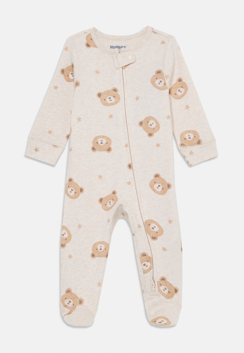 Šviesiai rudas kūdikių kombinezonas ilgomis rankovėmis, su pakartotine meškos ir žvaigždžių raštu, ir priekyje užtrauktuku, kad būtų lengviau apsirengti.