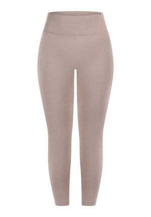 Beige legging met een hoge tailleband, gemaakt van rekbare stof. Het ontwerp heeft een gladde textuur en een figuurvormende pasvorm.