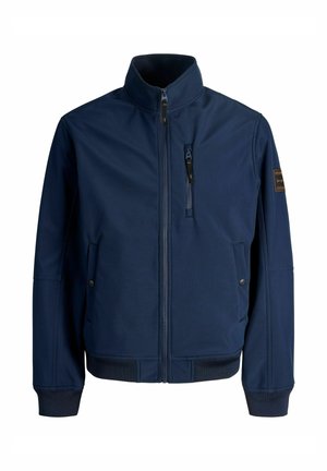 Marineblaue Reißverschlussjacke mit hohem Kragen, Reißverschlusstasche auf der Brust, zwei Seitentaschen mit Knöpfen und einem Aufnäher am linken Ärmel.