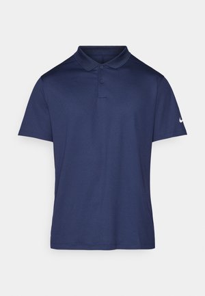 Polo shirt blu navy realizzato in tessuto morbido, dotato di colletto, pattina con tre bottoni e un piccolo logo bianco sulla manica sinistra.