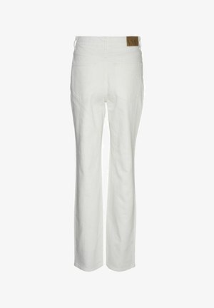 Valkoiset korkeavyötäröiset housut, jotka on valmistettu puuvillasekoitteesta. Niissä on suora lahkeen malli, kaksi takataskua ja merkitty ruskea tagi vyötäröllä.