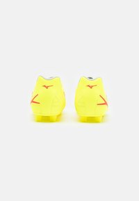 Mizuno Botines de fútbol para terreno firme - yellow