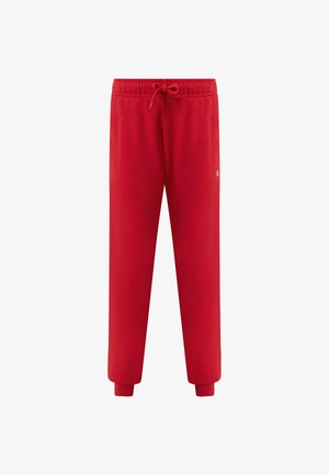 Rode trainingsbroek met elastische tailleband, verstelbaar trekkoord, geribbelde enkels en een klein wit logo op de bovenste linker dij.