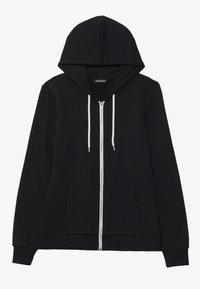 Svart zip-up hoodie med en framficka, vita dragningssnören och en mjuk textur. Har en standardhuva och ribbade muddar.