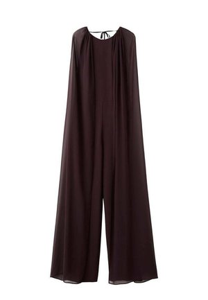 Mono fluido de color púrpura oscuro con diseño tipo capa, escote redondo y cierre con lazo en la espalda; cuenta con pierna ancha y textura suave.