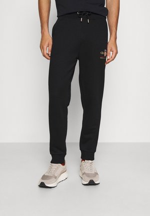ARCHIVE SHIELD - Spodnie treningowe - black