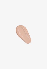 Producto cosmético suave con forma de lágrima en un color beige suave, con un acabado brillante y un sutil patrón de pinceladas.