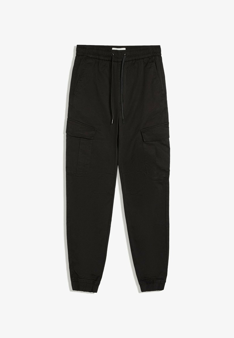 Pantalon cargo jogger noir avec taille élastique, cordons noirs, poches latérales à rabat et poignets élastiques.