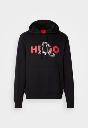 Black hoodie with a front pocket, featuring a graphic of a snake and the word "HUGO" in red. Made from soft fabric with ribbed cuffs.