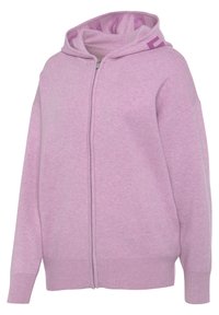 Rosa Zip-Up-Hoodie aus weichem Material. Verfügt über eine geräumige Kapuze, gerippte Bündchen und eine lockere Passform. Das Innenfutter hebt sich durch eine kontrastierende Farbe hervor.
