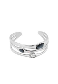 Pulsera de mano de plata con tres bandas onduladas, que presenta dos piedras negras, una piedra rosa y una piedra clara en un diseño abierto.