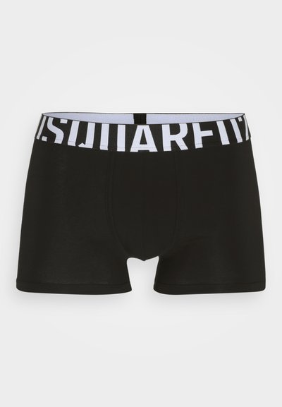 Black boxer briefs with a white elastic waistband featuring the brand name. Soft, stretchy fabric with a fitted design and seamless edges.