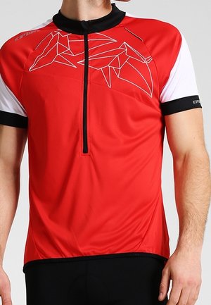 Maillot de cyclisme rouge avec manches courtes noires, motifs géométriques blancs sur la poitrine, fermeture éclair à l'avant et design ajusté pour la performance.