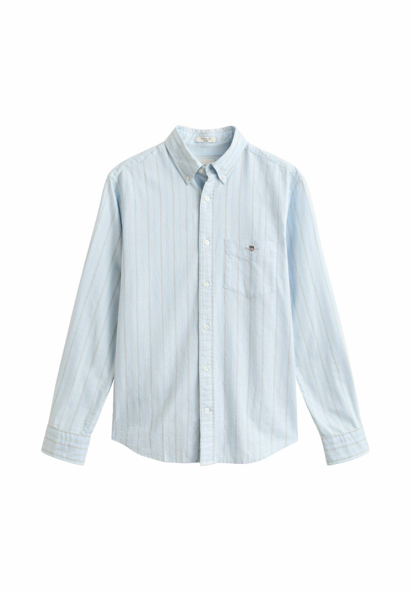 Camicia azzurro chiaro con sottili strisce verticali bianche e arancioni, maniche lunghe, tasca sul petto e colletto con bottoni.