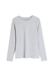 Jasnoszara koszula z długim rękawem wykonana z miękkiej bawełny. Posiada okrągły dekolt i luźny krój z minimalną ilością szwów.