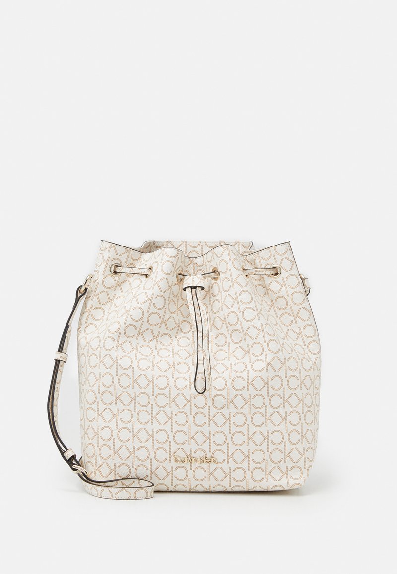 Calvin Klein DRAWSTRING BUCKET BAG MONOGRAM Across body bag white