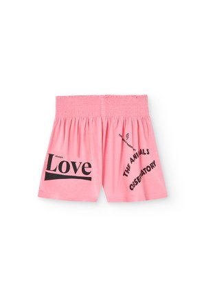Shorts en coton rose avec une taille élastique. Présente un texte noir : "Always Love" et "THE ANIMALS OBSERVATORY" dans des emplacements et tailles variés.