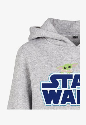 Sweat à capuche gris avec un grand texte bleu "Star Wars" et un petit personnage vert aux grandes oreilles dépassant par-dessus les lettres.