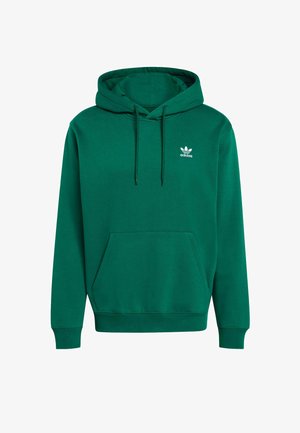Felpa con cappuccio verde in tessuto misto cotone, con tasca frontale, polsini a costine e logo Adidas bianco sul petto.