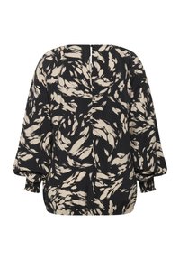 Blouse noire et beige à motifs, manches longues, poignets froncés et encolure ronde. Tissu texturé avec un motif en tourbillons de coups de pinceau.