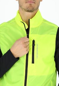 Swedemount PACKABLE WIND - Bodywarmer - neon