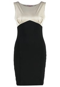 Robe sans manches avec un corsage en satin crème et une jupe noire ajustée à design bicolore, mettant en valeur des textures lisses et des lignes épurées.