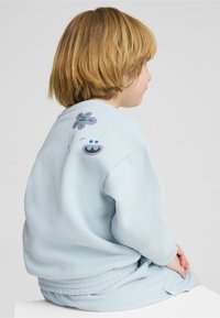 Puma X TROLLS GRAPHIC CREW  - Sweatshirt - frosted dew