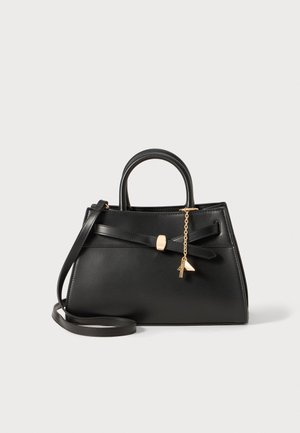 Black leather handbag with a structured shape, featuring a top handle, detachable shoulder strap, and gold-tone hardware accents.