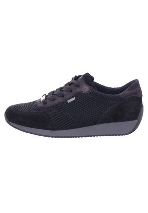 Black sneaker with mesh and suede materials, rounded toe, lace-up design, textured sides, and a flexible, gray rubber sole.