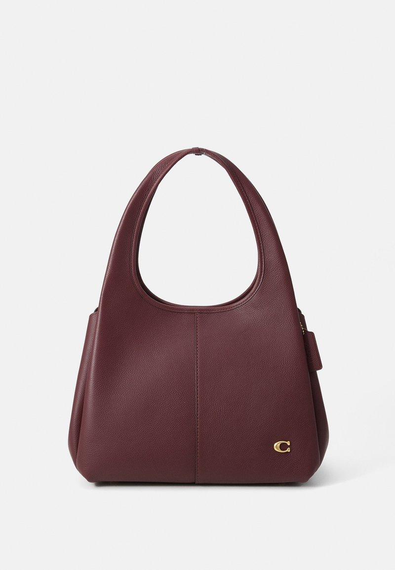 Burgundy leather shoulder bag with a wide, curved handle, smooth texture, and a gold logo accent on the side. Designed with a structured shape.